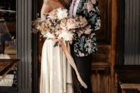 09 an edgy groom’s outfit with black skinny pants, black moccasins, a white shirt, a pink tie and a floral blazer