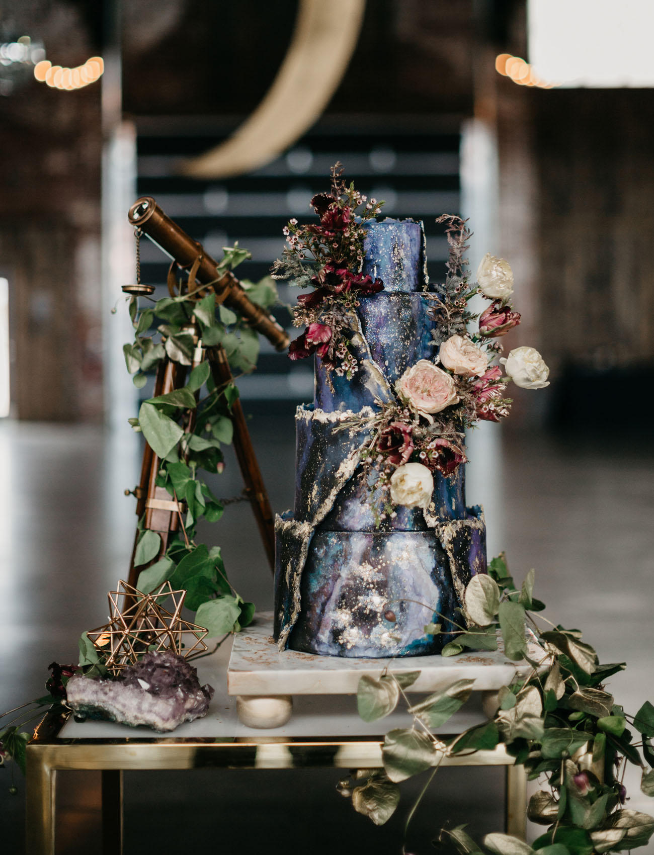 The wedding cake was a real masterpiece inspired by galaxies, with dried herbs and blooms