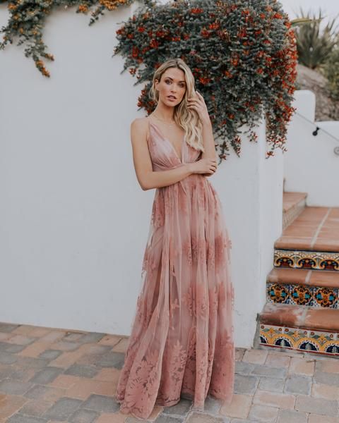 a dusty pink maxi lace dress on straps with a plunging neckline is a very romantic and girlish idea