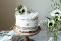10 a vegan matcha pistachio tres leches wedding cake with fresh blooms on top
