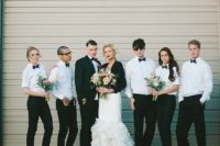 10 both bridesmaids or groomsladies and groomsmen wearing white shirts, black pants and bow ties and black shoes