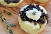 10 onion confit tartlets are a savory wine infused appetizer with a dollop of vegan ricotta and fresh thyme