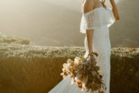 11 a fantastic lace off the shoulder wedding dress with a long train and fringe looks super romantic