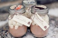 11 hot cocoa jars never go out of style, they are ideal for fall and winter weddigns to warm your guests up