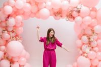 12 a super cute pink balloon wedding arch with pink and white blooms interwoven is a very cool idea