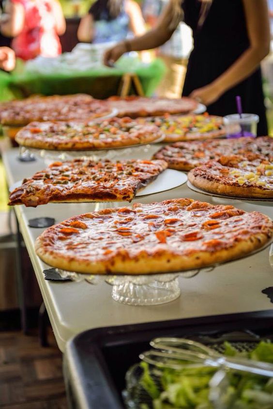 an elegant pizza buffet with crystal cake stands is a chic idea for many types of weddings