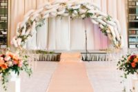 14 a unique chain balloon wedding arch with greenery and blush blooms interwoven for a fantastic look