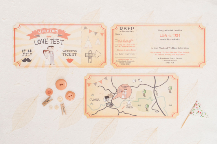 an illustrated ticket-style wedding invitation suite is a gorgeous idea