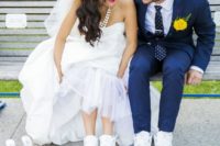 15 the bride can change her gorgeous heels to the same white sneakers as the groom to feel comfy while walking