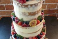 16 a delicious semi naked vegan wedding cake decorated with fresh fruit including figs, blackberries, blueberries,strawberries and others