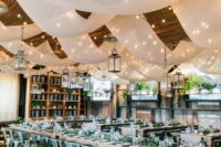 16 lots of airy neutral fabric hangings with lights is a cool maximalist idea for wedding decor