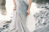 17 an ethereal pearly grey wedding dress with wide straps, a scoop neckline and an embellished bodice