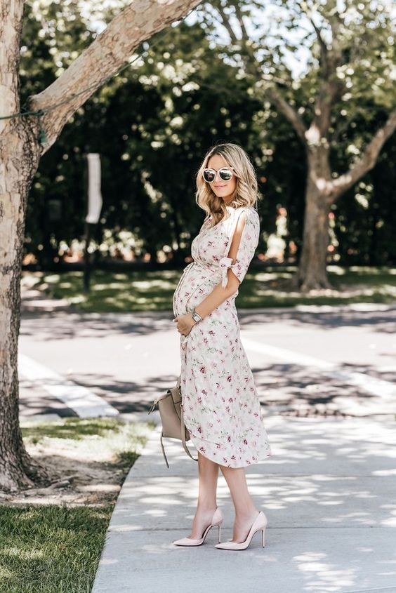 a neutral floral wrap midi dress with a cold shoulder and blush heels for an effortlessly chic spring wedding guest look