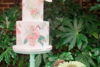 19 a beautiful handpainted flamingo wedding cake for a tropical wedding topped with a fresh bloom
