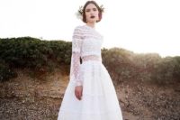 20 a unique midi A-line polka dot wedding dress with with sheer parts, lace, long sleeves and a high neckline