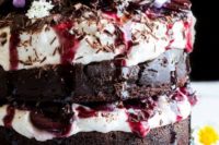 20 a vegan black forest cake with fluffy cream, drunken cherries, and moist chocolate layers
