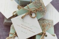 20 all-natural handcrafted soaps with labels and rope are a great idea for a beach or coastal wedding