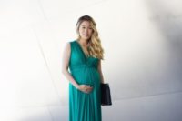 21 a turquoise maxi dress with a draped bodice and no sleeves plus a black clutch is an easy and cool outfit