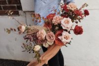 22 a beautiful fall wedding bouquet with rust and blush blooms and pampas grass plus airy ribbons