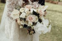 22 a chic neutral bouquet with blush and white blooms including anthuriums for a unique look