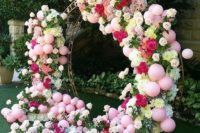 22 a giant balloon, roses and greenery wreath can become a unique wedding backdrop