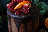 22 a vegan chocolate gluten-free and nut-free wedding cake with dripping, citrus and pomegranate on top