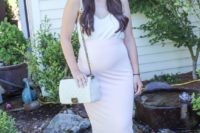 23 a casual summer wedding guest look with a blush high waisted midi, a white spaghetti strap top and a white bag
