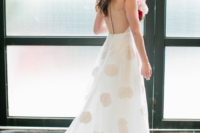 25 a white A-line wedding dress with tan polka dots, a train and a sheer back on a row of sparkling buttons for a modern bride