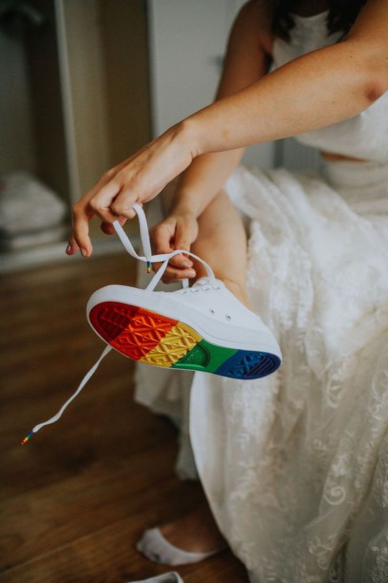 white sneakers with rainbow bottoms are a fun idea for a bride who loves casual and wants comfort