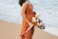 28 a refined rust wrap maxi dress with side slits, spaghetti straps and a sash for a beahc wedding