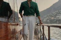 a cool beach or coastal wedding guest look with white linen pants, a green linen shirt and a rope belt