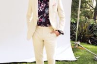 a cremay suit, black espadrilles and a moody floral shirt, which is great for a tropical wedding