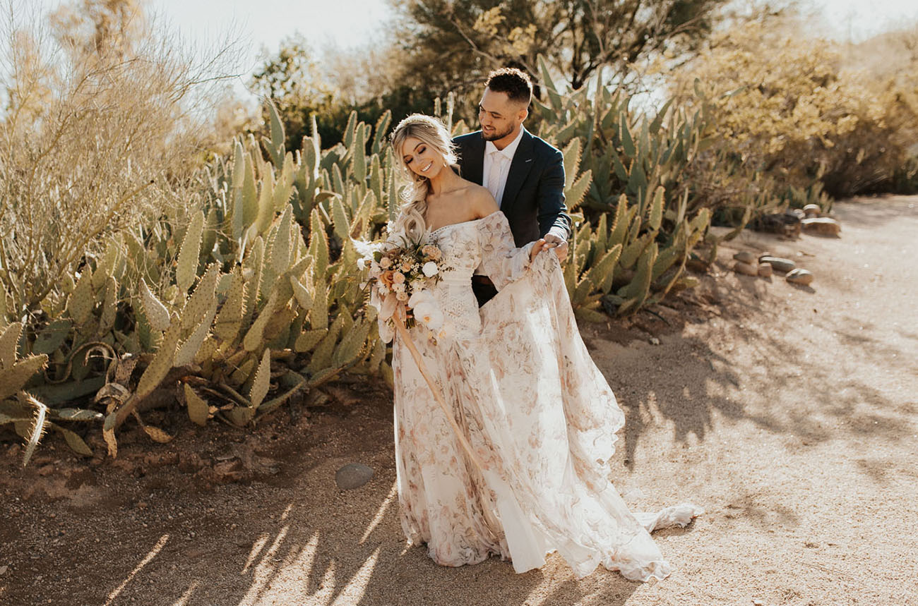 This boho elopement too place in a cactus garden, was done with rust and peachy hues and boho touches