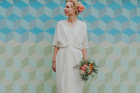 02 The bride was wearing a modern draped wedding dress, coral shoes and coral peonies