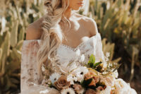 03 Her look was finished with gorgeous smokey eyes, a wild braid and a little floral crown