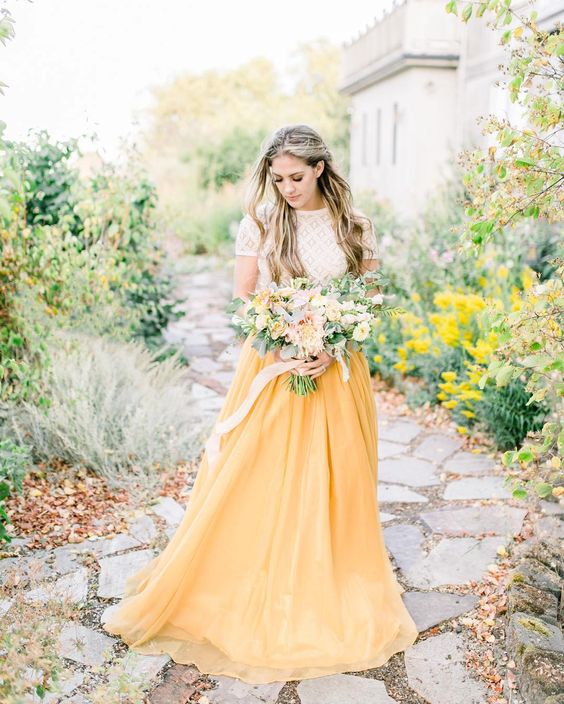 a bright spring bridal look with a neutral lace top and a yellow maxi skirt is a beautiful and trendy outfit