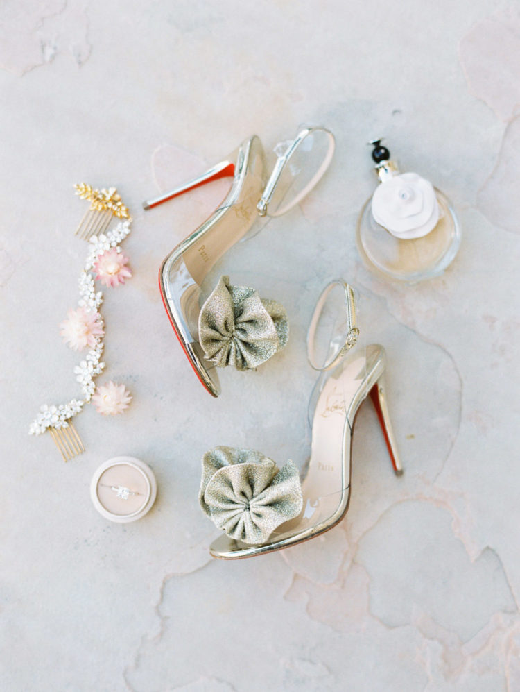 The bride was rocking whimsy heels and cute floral accessories