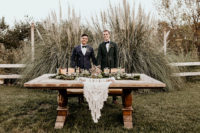 05 The reception table was styled with macrame, greenery, black candles and a vintage rustic table