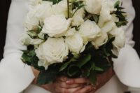 05 a white rose wedding bouquet is classics and elegance that never go out of style and look amazing
