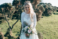 bride with a quite neutral wedding bouquet looks chic