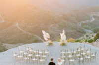 06 The ceremony space was done with chic chairs and a wedding altar with pampas grass, gold foliage and blooms