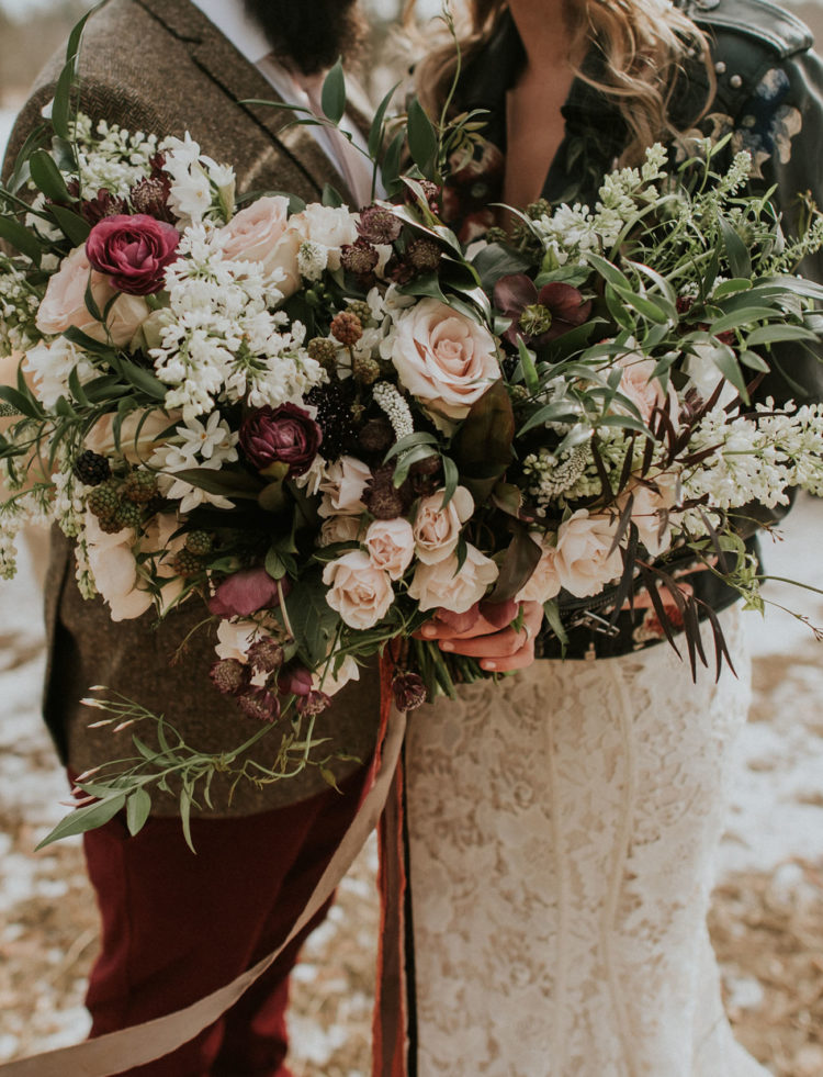 What a gorgeous and lush wedding bouquet done with blush blooms, burgundy ones and some berries