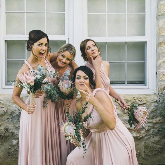a pic of bridesmaids having fun before the wedding ceremony is priceless, forget all those traditional and boring portraits