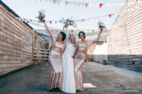 07 The bridesmaids were wearing rose gold sequin maxi dresses with wide sleeves