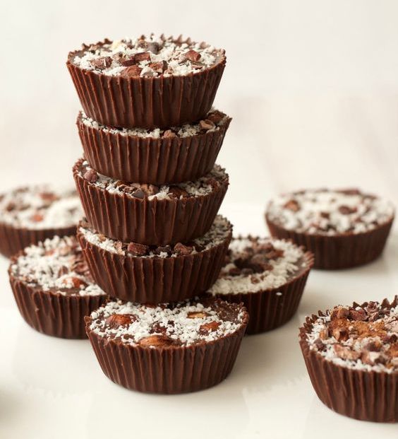 raw chocolate hazelnut cups with coconut on top are vegan, gluten-free and dairy-free, which is amazing