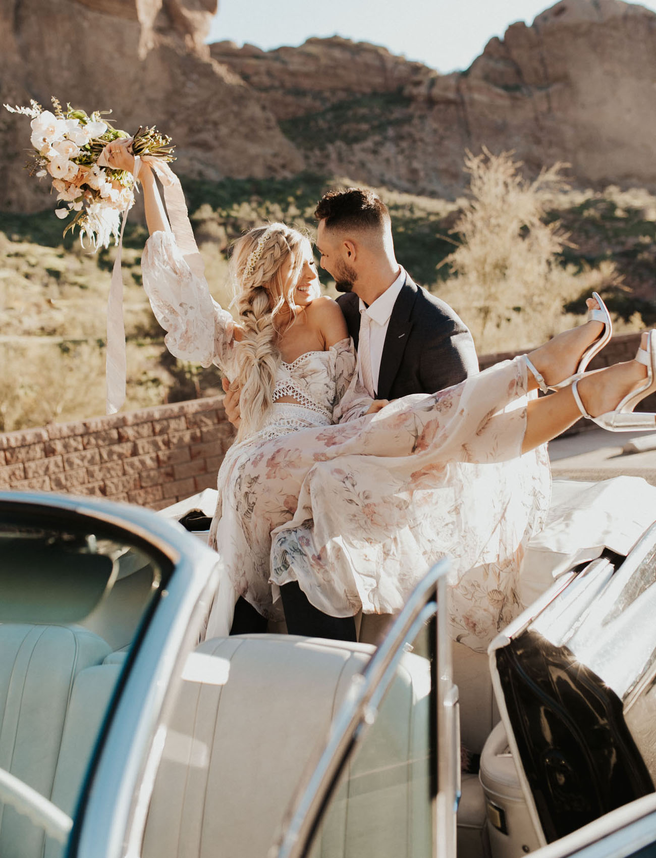 Riding a retro car is a fun adventure for a couple on their wedding day