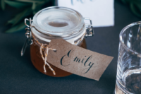 11 Homemade jam jars were offered as wedding favors and card holders