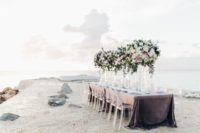 11 The wedding tablescape was done right on the beach
