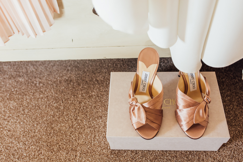 copper knotted mules by Jimmy Choose are a hot idea to accent your wedding outfit and give it an edgy feel