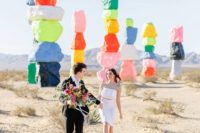 14 Seven Magic Mountains in Nevada is a gorgeous place to elope to if you love bold colors and color blocking
